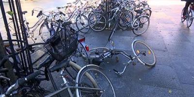 bikes parking on sidewalk